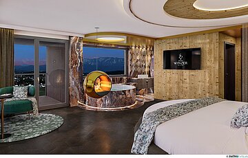 Visualisierung einer modernen Hotelsuite mit großem runden Bett, einer hellen Holz-Akzentwand mit TV und einem Whirlpool direkt am Panoramafenster mit Blick auf die Berge bei Dämmerung. In der Mitte hängt ein eleganter, kugelförmiger Kamin in Gold.