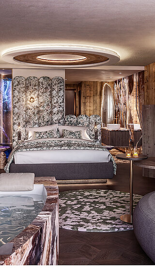 Juniorsuite Kuschelnest im Hotel Winzer mit Doppelbett, Holzinterieur und gemütlichem Wohnbereich