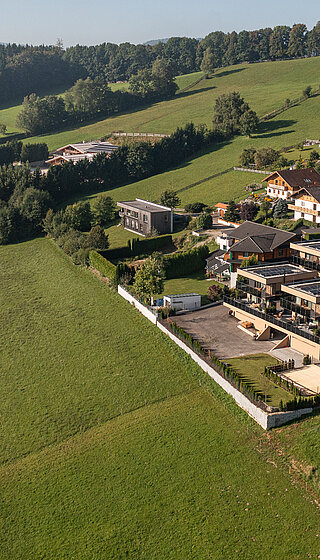 Exterior view of the Private Spa Villa Austria at the Hotel Winzer in the sunshine