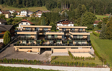 Exterior view of the Private Spa Villa Austria at the Hotel Winzer in the sunshine